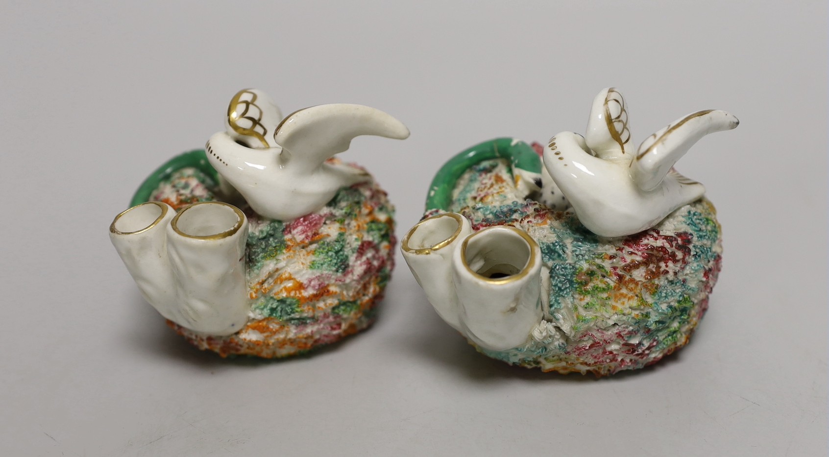 Two similar Staffordshire porcelain 'bird's nest' quill holders, c.1830-50